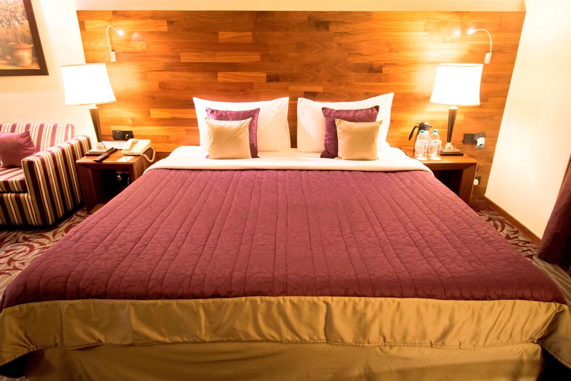 The Orchid Hotel Hinjewadi Púna Exteriér fotografie A bed